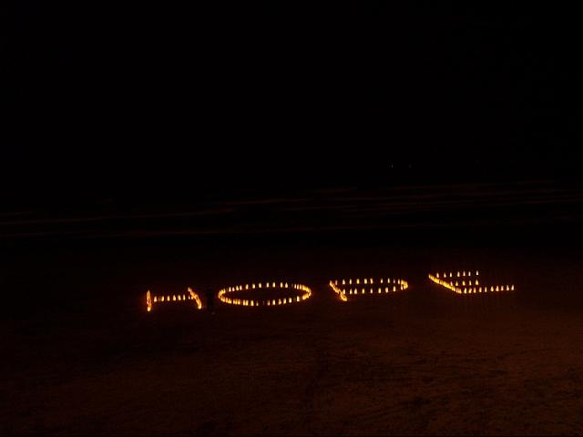 H-O-P-E spelled out at Ocean Beach San Francisco with 300 homemade lanterns