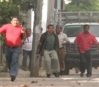 paramilitary swines hunting civilians in oaxaca, mexico