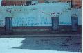 Weg met Aguas de Illimani op een muur in El Alto