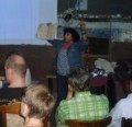 Martha met symbolisch een machette in haar hand tijdens bijeenkomst in Groningen