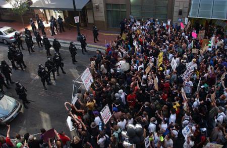 Portland-22/08: Protesters gather near a police line.