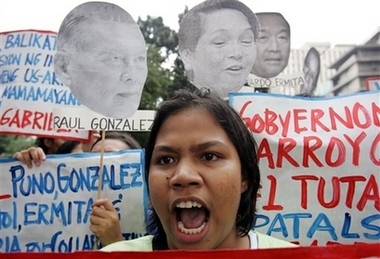 A protester shouts slogans during a rally near the U.S. Embassy in Manila